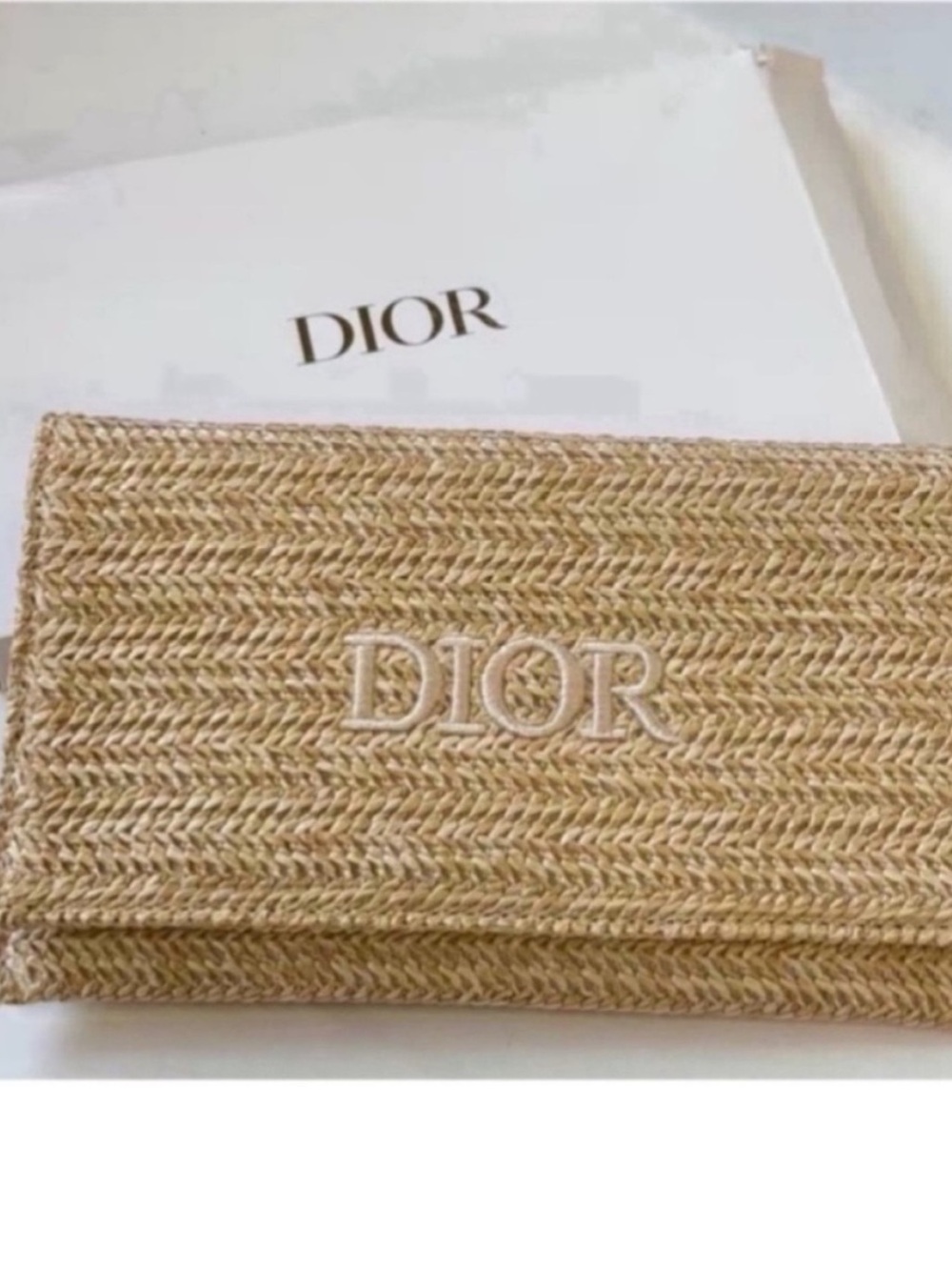 Dior beauty gift straw pouch